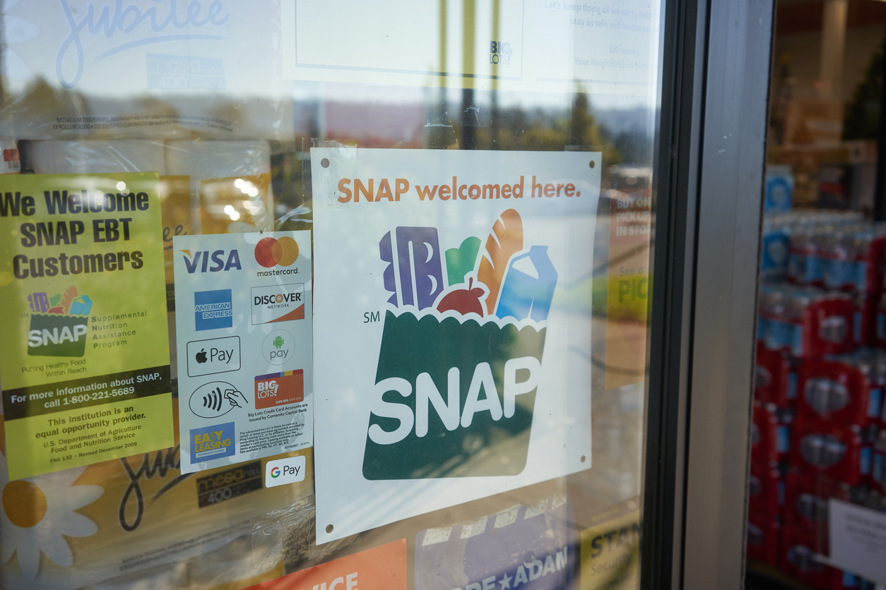 Portland, OR, USA - Oct 28, 2020: "SNAP welcomed here" sign is seen at the entrance to a Big Lots store in Portland, Oregon. The Supplemental Nutrition Assistance Program (SNAP) is a federal program.